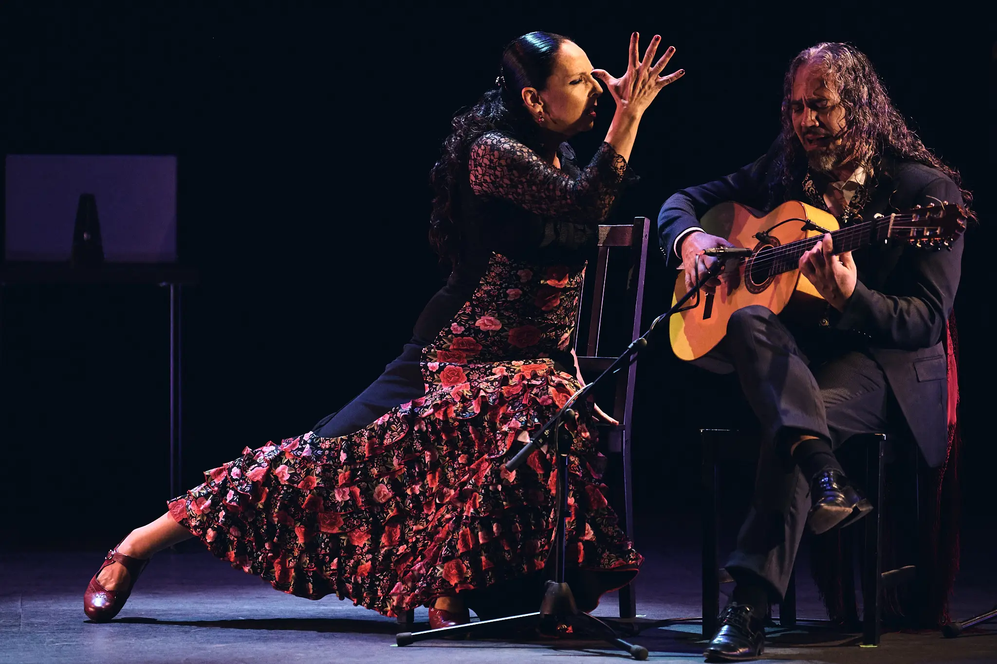 Guitarrista y bailaora compartiendo escenario